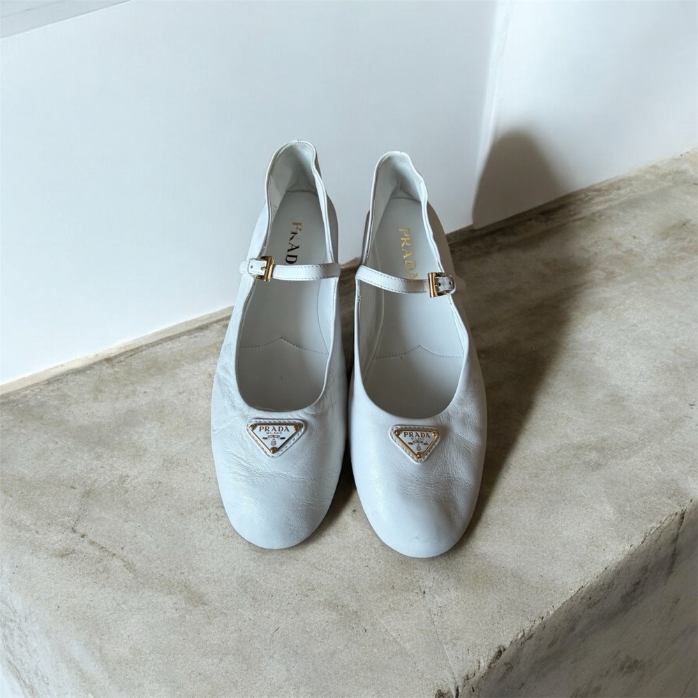 Prada White Leather Interior with Gold Logo
